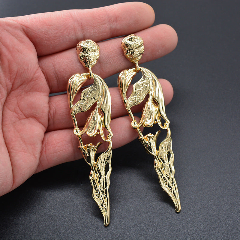 Metal atmospheric human-shaped earrings