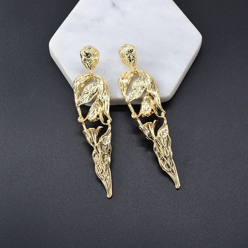 Metal atmospheric human-shaped earrings