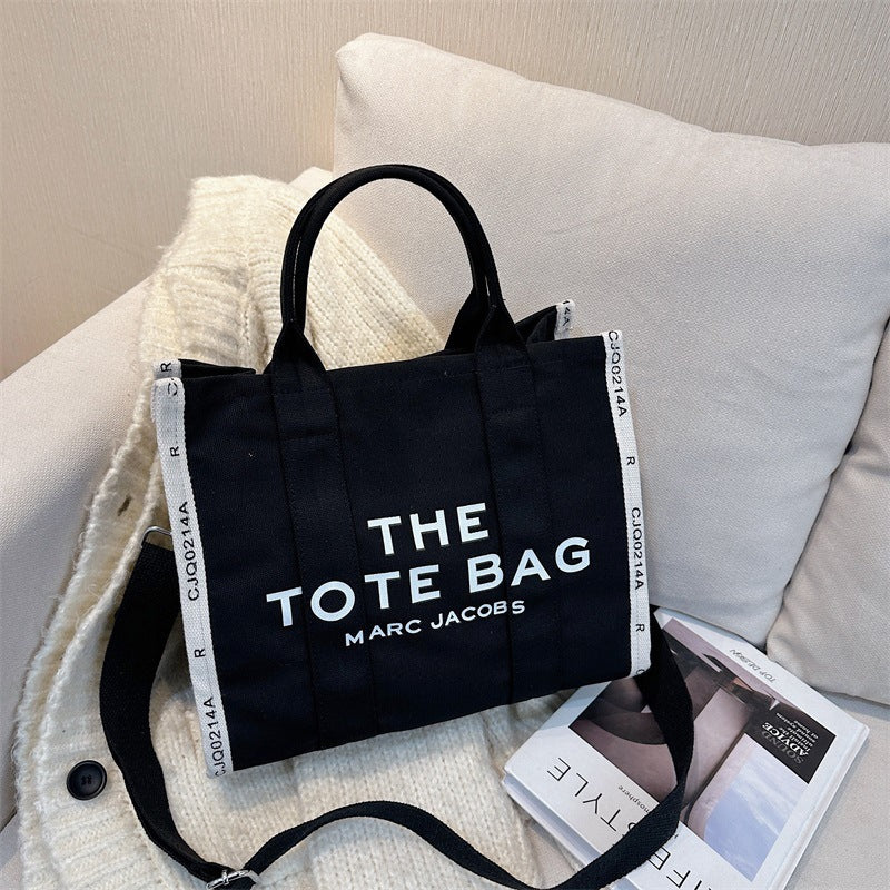 Popular retro women's bag 2023 new foreign trade color contrast letters portable tote bag large capacity canvas messenger bag